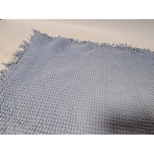 239 - 2 vintage mid century blankets to include a blue one with tassels measuring 190cm x125cm and a white... 