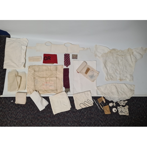242 - A collection of vintage fabrics to include Victorian and early to mid 20th century items. Highlights... 