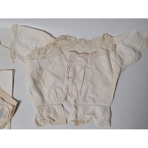 242 - A collection of vintage fabrics to include Victorian and early to mid 20th century items. Highlights... 