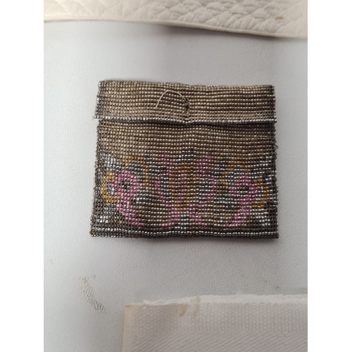 242 - A collection of vintage fabrics to include Victorian and early to mid 20th century items. Highlights... 