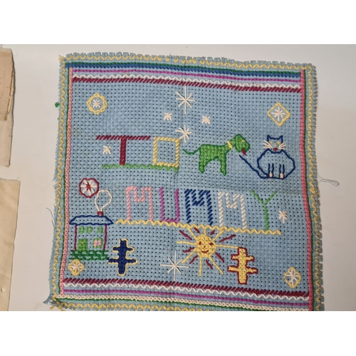 243 - A collection of late 19th to early to 20th century fabric samplers and cross stitch fabrics.