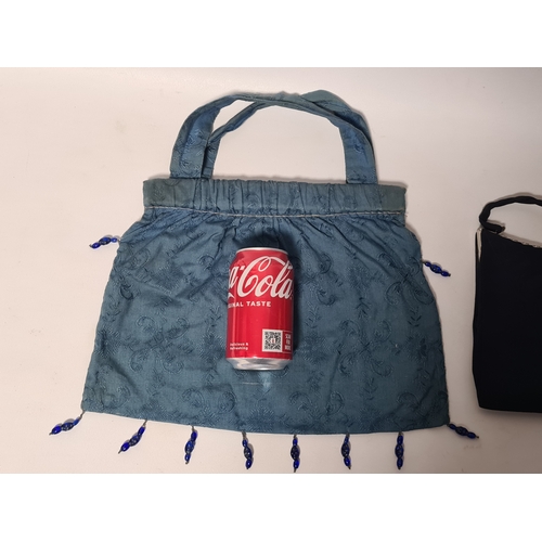 244 - A collection of 4 Ladies mid 20th century handbags to include a blue embroidered and beaded bag, a b... 