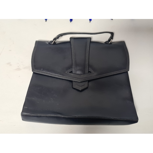 244 - A collection of 4 Ladies mid 20th century handbags to include a blue embroidered and beaded bag, a b... 