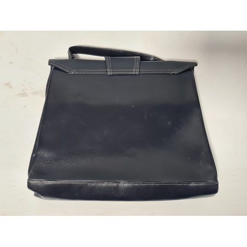 244 - A collection of 4 Ladies mid 20th century handbags to include a blue embroidered and beaded bag, a b... 