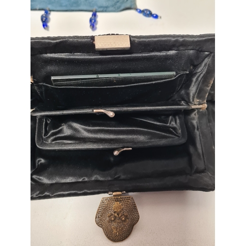 244 - A collection of 4 Ladies mid 20th century handbags to include a blue embroidered and beaded bag, a b... 