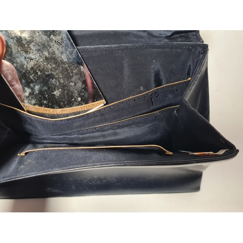 244 - A collection of 4 Ladies mid 20th century handbags to include a blue embroidered and beaded bag, a b... 