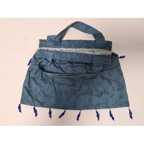 244 - A collection of 4 Ladies mid 20th century handbags to include a blue embroidered and beaded bag, a b... 