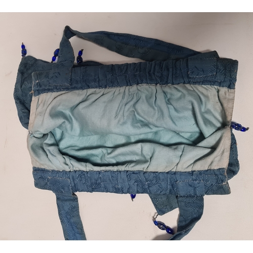 244 - A collection of 4 Ladies mid 20th century handbags to include a blue embroidered and beaded bag, a b... 