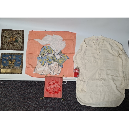 245 - A collection of early to mid 20th century East Asian fabrics to include a Kobe, Japan shirt, a Japan... 