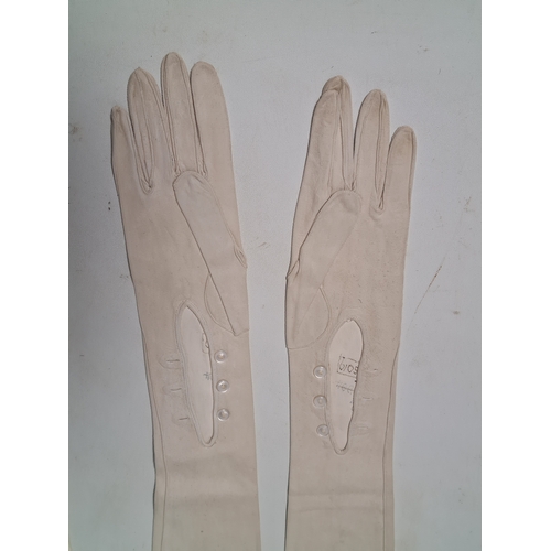 248 - A collection of 6 Victorian or Edwardian Ladies long white Gloves to include 2 pairs. 4 gloves made ... 