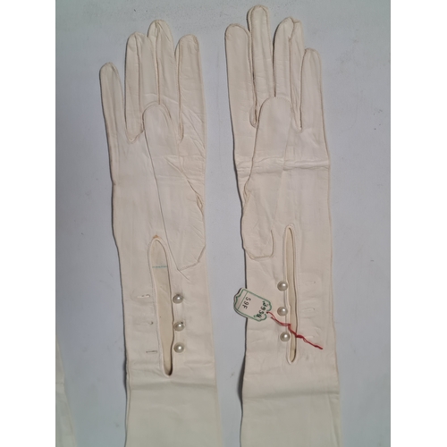 248 - A collection of 6 Victorian or Edwardian Ladies long white Gloves to include 2 pairs. 4 gloves made ... 