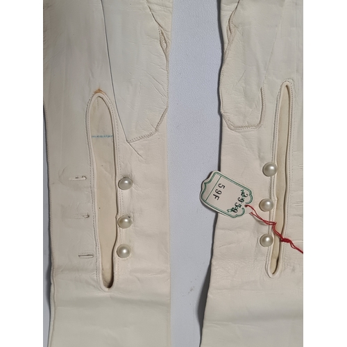 248 - A collection of 6 Victorian or Edwardian Ladies long white Gloves to include 2 pairs. 4 gloves made ... 