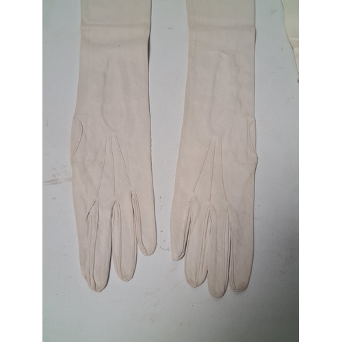 248 - A collection of 6 Victorian or Edwardian Ladies long white Gloves to include 2 pairs. 4 gloves made ... 