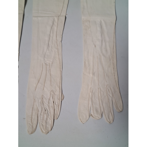 248 - A collection of 6 Victorian or Edwardian Ladies long white Gloves to include 2 pairs. 4 gloves made ... 