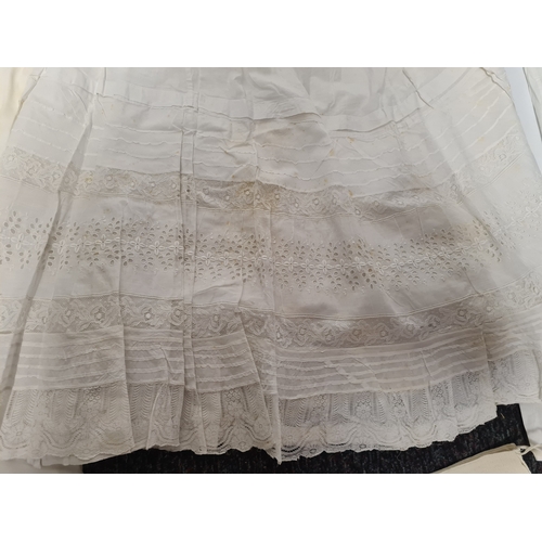 298 - A collection of 5 Victorian & Edwardian white underskirts & slips. Some have lace detailing