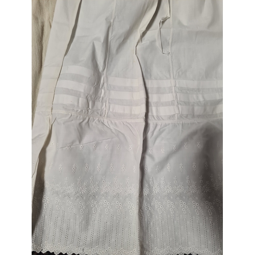 298 - A collection of 5 Victorian & Edwardian white underskirts & slips. Some have lace detailing