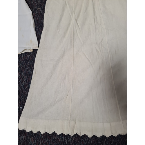 298 - A collection of 5 Victorian & Edwardian white underskirts & slips. Some have lace detailing