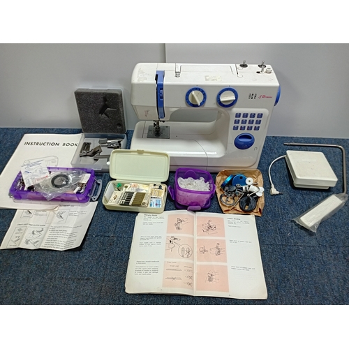183 - BUSH 988 elektromechanical household sewing machine and a full set of accessories. No cable so not t... 