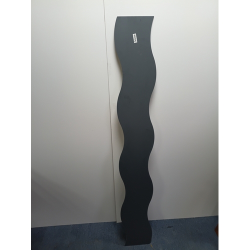 6 - An IKEA Krabb wavy wall mirror.  Height 63 inches x width 8 inches.
