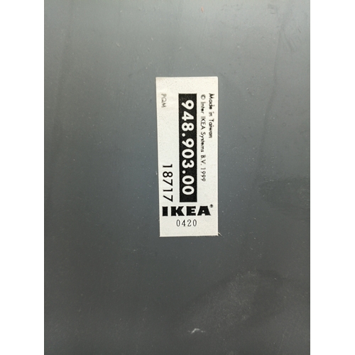 6 - An IKEA Krabb wavy wall mirror.  Height 63 inches x width 8 inches.