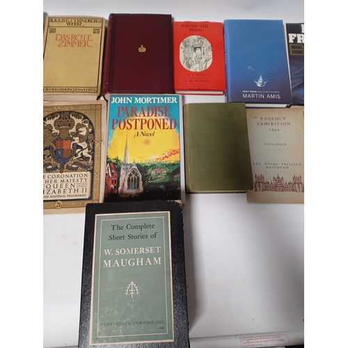 14 - A collection of books to include,  paradise postponed, shadows, winnie the poo, a Christmas carol an... 