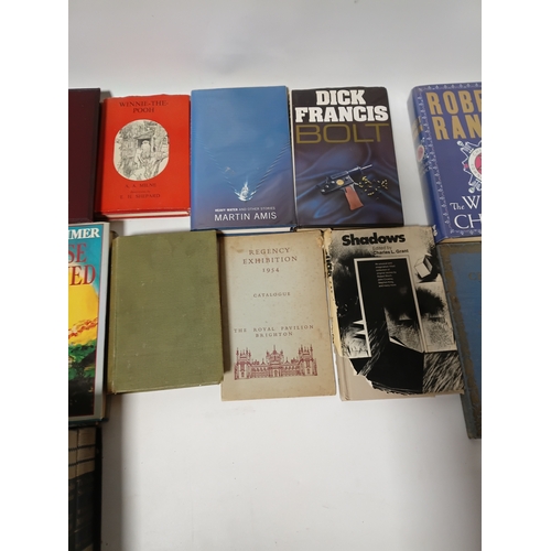14 - A collection of books to include,  paradise postponed, shadows, winnie the poo, a Christmas carol an... 