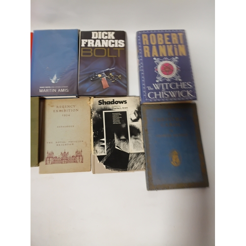14 - A collection of books to include,  paradise postponed, shadows, winnie the poo, a Christmas carol an... 