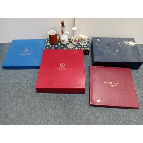 15 - A collection of ceramic items, including tea sets, decorative plates with emblems and sets of crysta... 