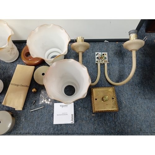 20 - A pair of vintage wall mounted lamps complete with instructions and fittings.