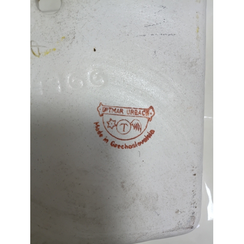 37 - A job lot of ceramic items to include, vases, cups figurines, spoons and more. The largest item meas... 