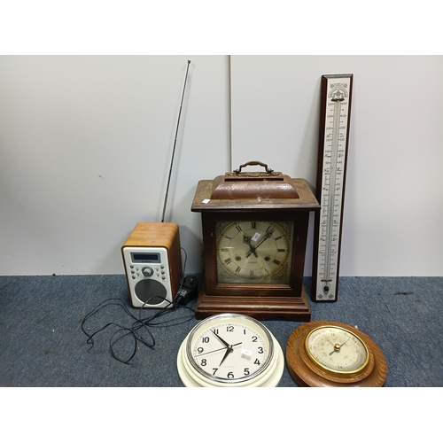 203 - A collection of clocks, barometers and a thermometer to include  a Tristar mantle clock, a quartz cl... 