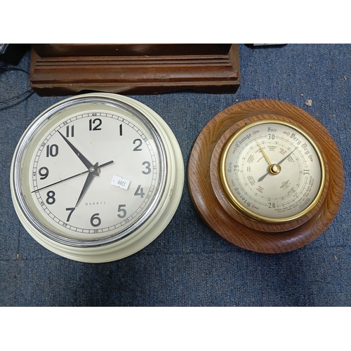 203 - A collection of clocks, barometers and a thermometer to include  a Tristar mantle clock, a quartz cl... 