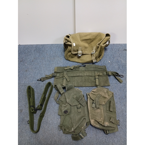 204 - A collection of 4 British army items which display the broadarrow. To include, a canvas heavy duty b... 