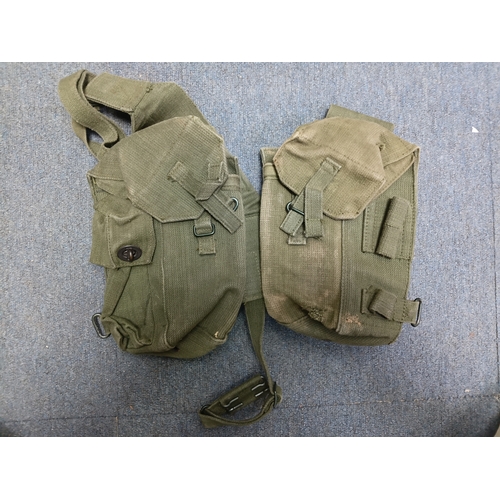 204 - A collection of 4 British army items which display the broadarrow. To include, a canvas heavy duty b... 