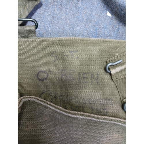 204 - A collection of 4 British army items which display the broadarrow. To include, a canvas heavy duty b... 
