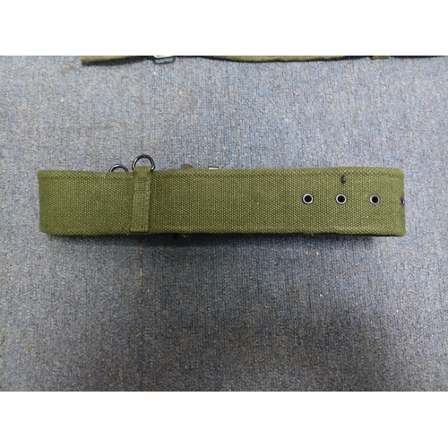 204 - A collection of 4 British army items which display the broadarrow. To include, a canvas heavy duty b... 