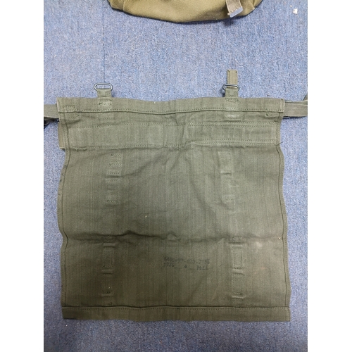 204 - A collection of 4 British army items which display the broadarrow. To include, a canvas heavy duty b... 