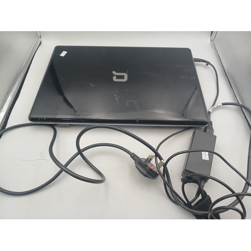 208 - A working Compaq Presario CQ71 laptop with a 17.3 inches screen, widows 7, 3 GB of ram, Intel Pentiu... 