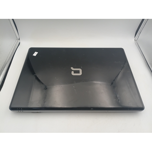 208 - A working Compaq Presario CQ71 laptop with a 17.3 inches screen, widows 7, 3 GB of ram, Intel Pentiu... 