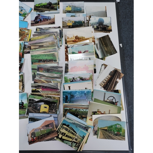 210 - A collection of post cards & photos of trains. Locations are at stations and museums