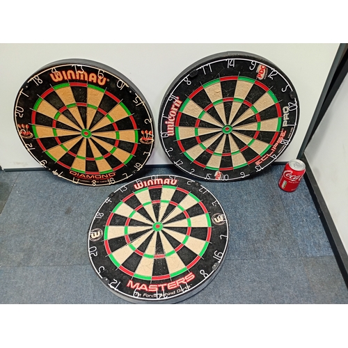 217 - Three dart boards to include Winmau diamond plus, winmau masters and unicorn eclipse Pro.