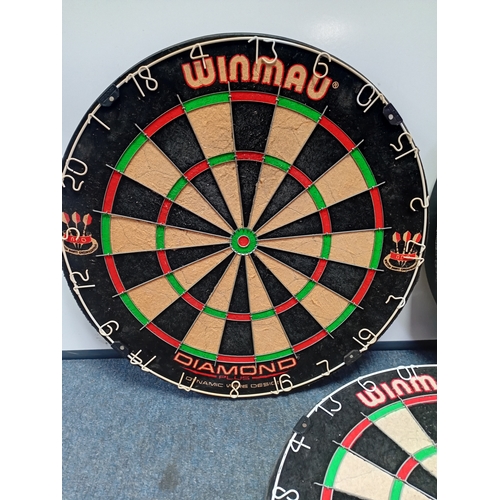 217 - Three dart boards to include Winmau diamond plus, winmau masters and unicorn eclipse Pro.