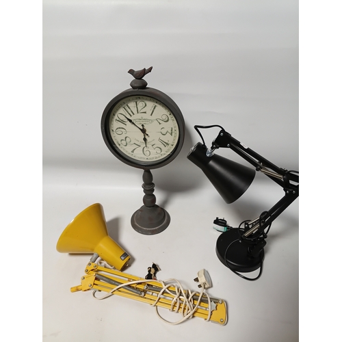 221 - A pair of pat tested and working angle poise style table lamps and a hotel Haywards clock, the large... 