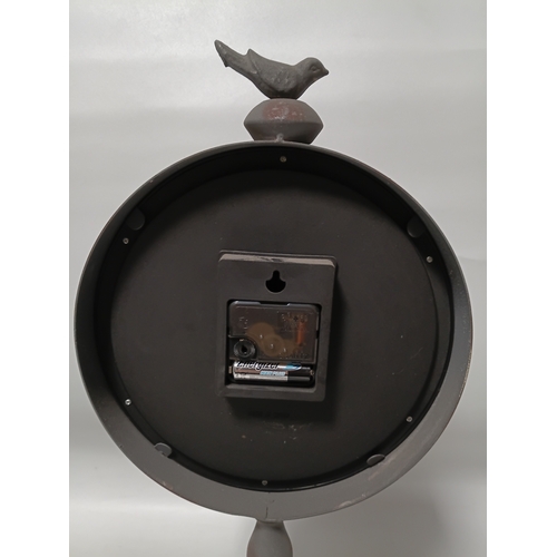 221 - A pair of pat tested and working angle poise style table lamps and a hotel Haywards clock, the large... 