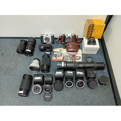 222 - A large set of vintage photographic equipment, mainly Vivitar and Prinzplex photographic lenses, as ... 