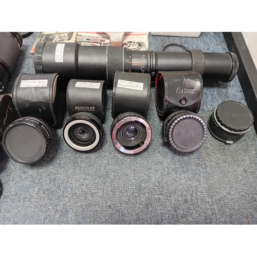 222 - A large set of vintage photographic equipment, mainly Vivitar and Prinzplex photographic lenses, as ... 