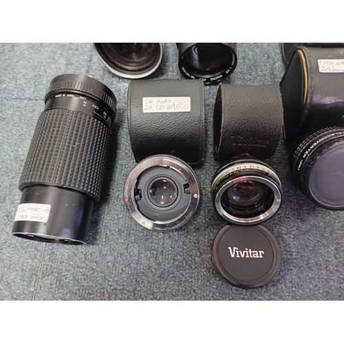 222 - A large set of vintage photographic equipment, mainly Vivitar and Prinzplex photographic lenses, as ... 