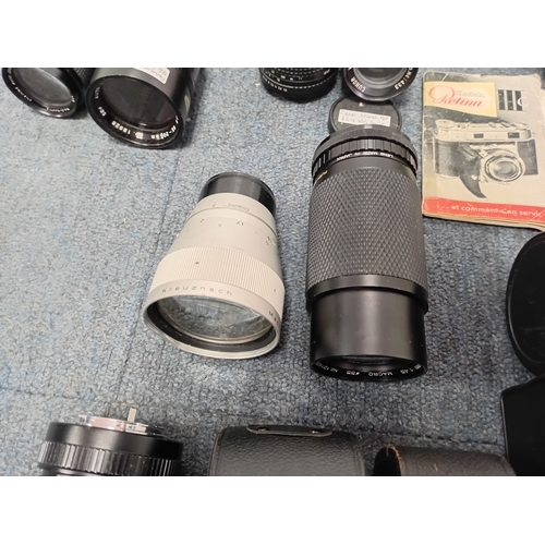 222 - A large set of vintage photographic equipment, mainly Vivitar and Prinzplex photographic lenses, as ... 