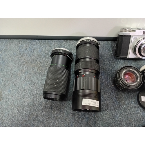 222 - A large set of vintage photographic equipment, mainly Vivitar and Prinzplex photographic lenses, as ... 