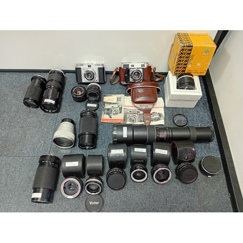 222 - A large set of vintage photographic equipment, mainly Vivitar and Prinzplex photographic lenses, as ... 
